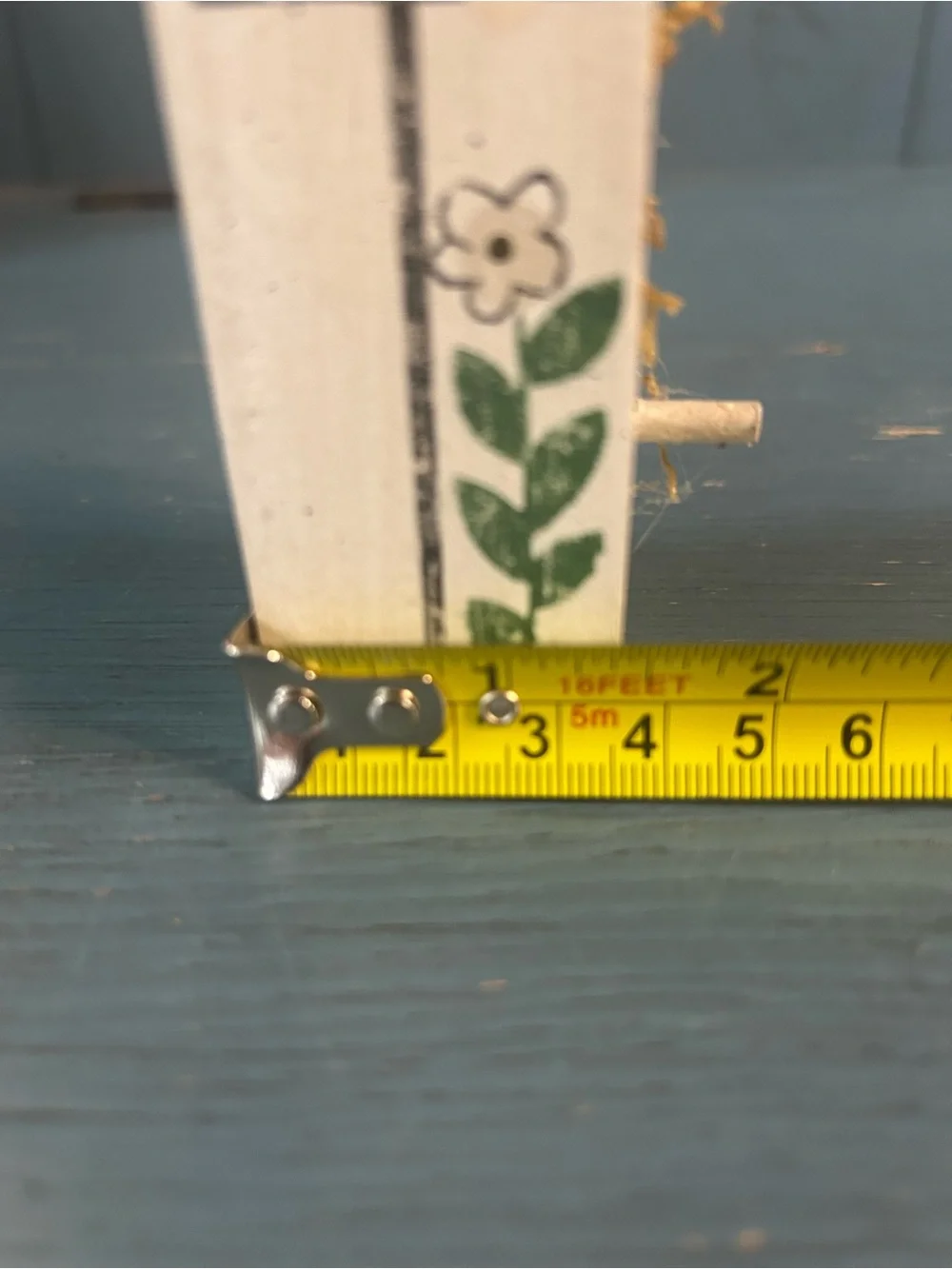 Hand Crafted White Birdhouse Wall Accent with Green Leaf and Pink Ribbon